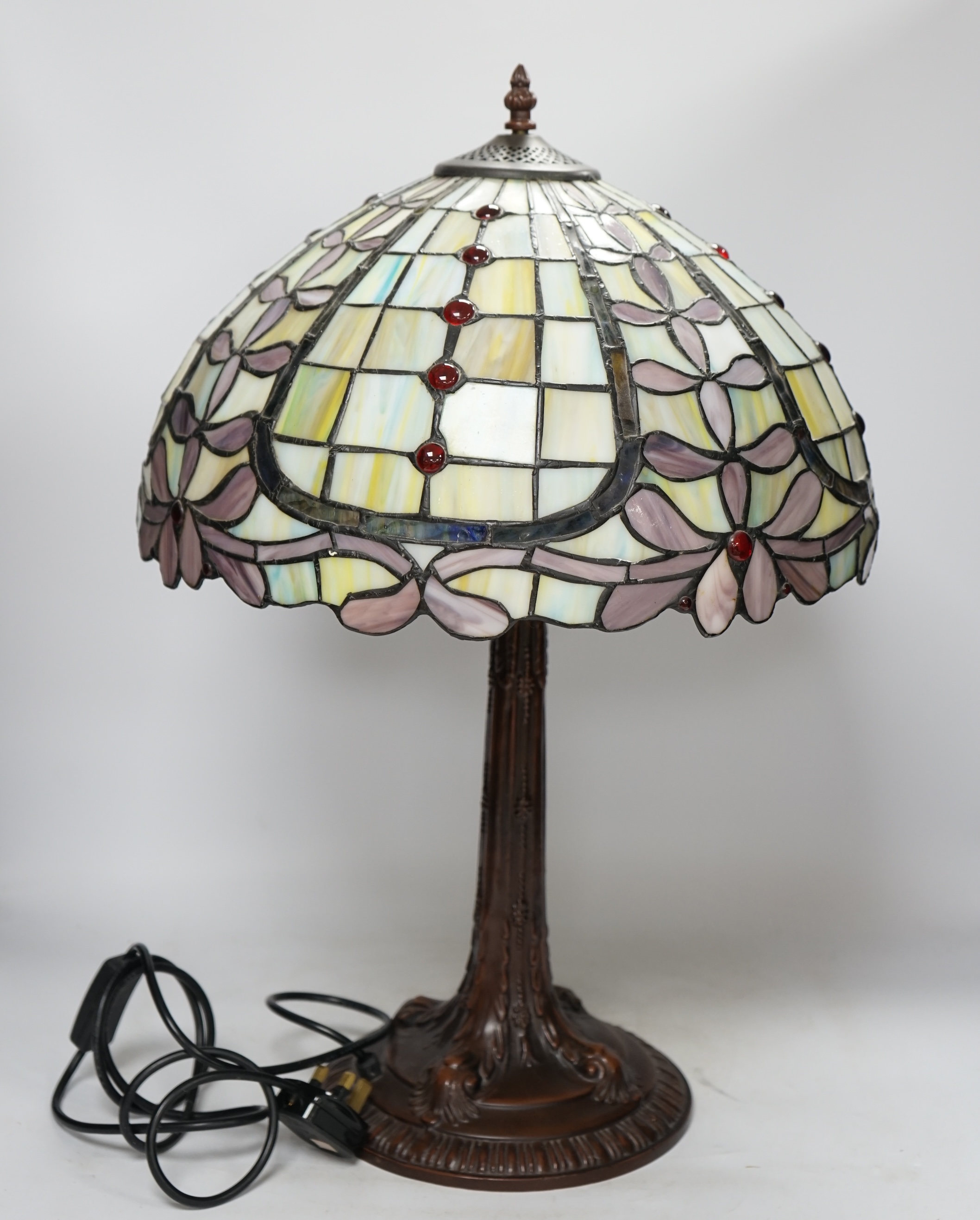 A reproduction Tiffany style table lamp, approximately 60cm high. Condition - good